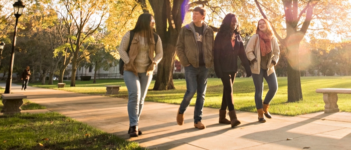 photo of four students on the Pittsburgh campus